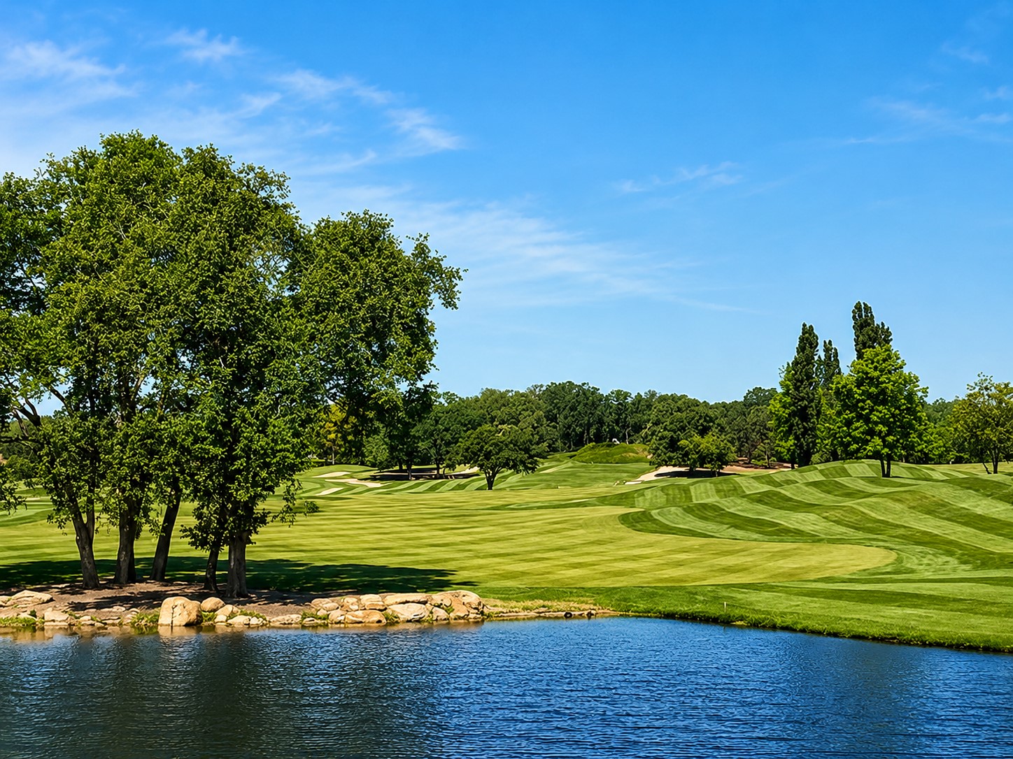 Greenhorn Creek Golf Resort with rolling hills and water